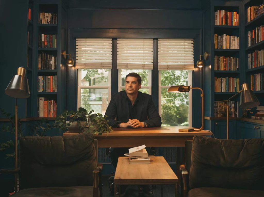Cal Newport in his home office in Takoma Park, Maryland. He prohibits cell phones and screens in this space.
GREG KAHN